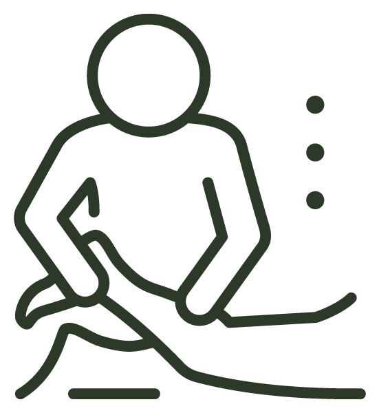 Icon image of a person giving a physical therapy on a table.